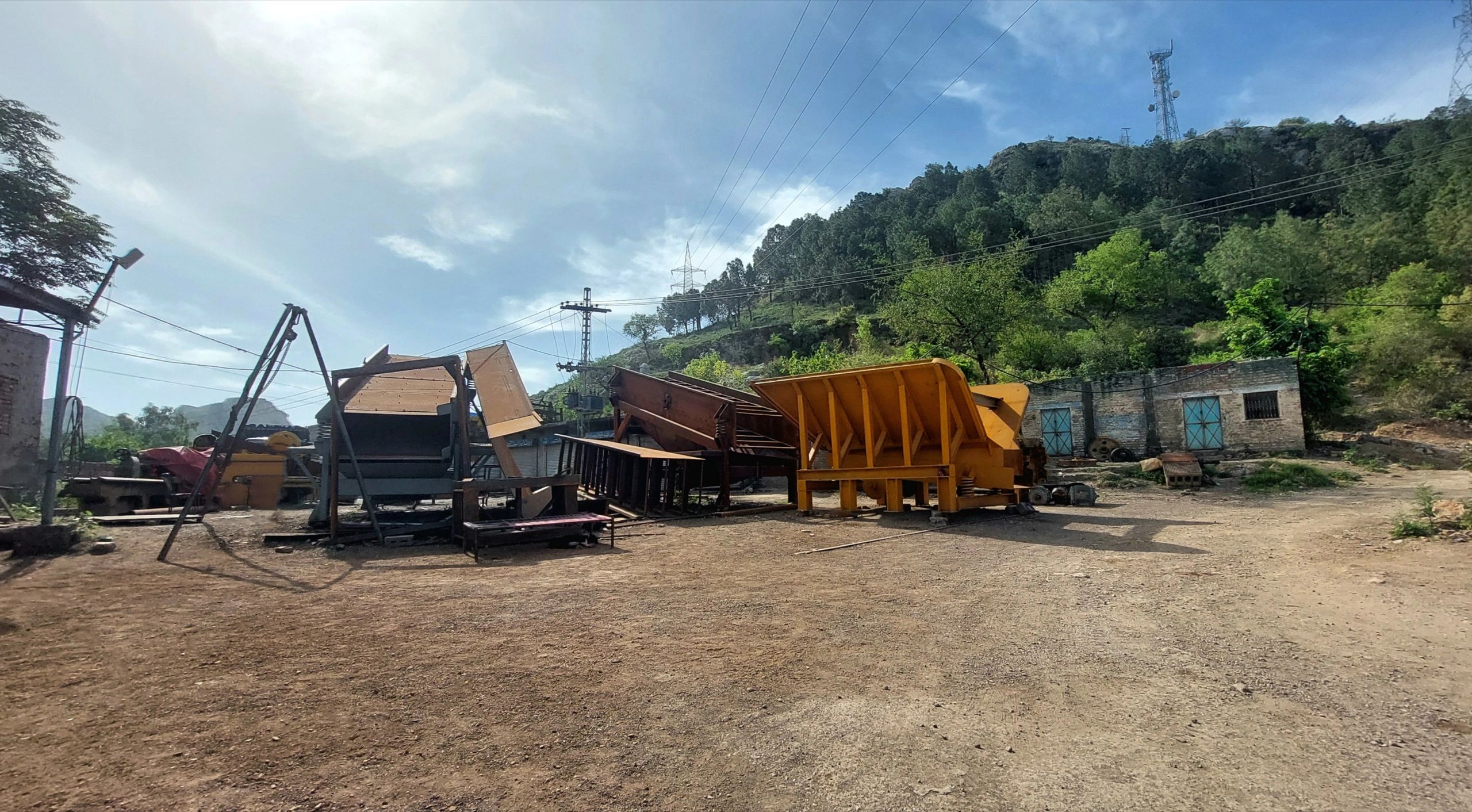 Mining equipment and industrial structures representing field operations